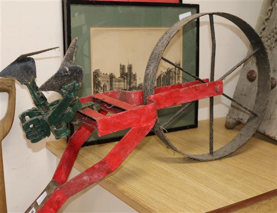 A 1920s single wheel pedestrian plough length 185cm